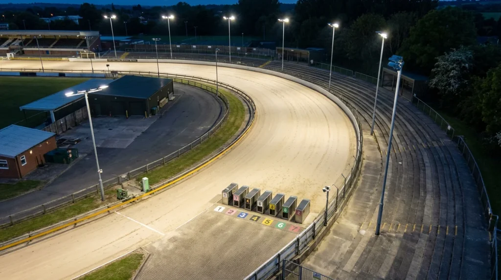 Overhead view of a greyhound track first bend showing trap positions and racing line